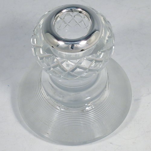 An Antique Victorian Sterling Silver and crystal match holder and striker, having a a very unusual round baluster body, with a silver rim around the match holder, a hand-cut hobnail pattern upper body and a lower ridged body for striking the matches. Made by James Round of Sheffield in 1895. The dimensions of this fine hand-made antique silver and crystal match striker are diameter 8.5 cms (3.3 inches), and height 9.5 cms (3.75 inches).