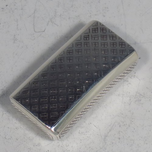 An Antique Georgian Sterling silver snuff box, having a rectangular body, with a slightly curved profile, with hand-engraved geometrical & floral decoration, a flat invisibly hinged lid with thumb-piece, and a gold-gilt interior. Made by Joseph Willmore of Birmingham in 1811. The dimensions of this fine hand-made antique silver snuff box are length 4.5 cms (1.75 inches), width 2.3 cms (0.8 inches), and it weighs approx. 17g (0.5 troy ounces).
