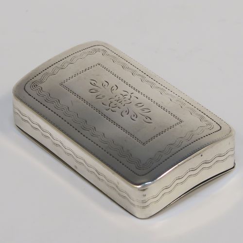 An elegant Antique Georgian Sterling Silver snuff box, having a rectangular body, with a slightly curved profile for holding in a waist-coat pocket, with hand-engraved geometrical & floral decoration, with a vacant rectangular cartouche on one side, a hinged lid and a gold-gilt interior. This beautiful antique silver snuff box was made by Joseph Willmore of Birmingham in 1826. The dimensions of this fine hand-made silver box are length 5.5 cms (2.25 inches), width 3.5 cms (1.3 inches), and it weighs approx. 27g (0.9 troy ounces).