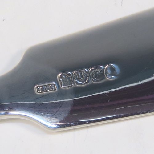 A very handsome Antique Scottish Georgian (William IV) Sterling Silver soup ladle in the Fiddle pattern, having a plain handle with a pip on the reverse, and a plain oval bowl with a heel on the reverse. This elegant antique silver soup ladle was made by James McKay of Edinburgh in 1836. The dimensions of this fine hand-made antique silver soup ladle are length 34.5 cms (13.5 inches), and it weighs approx. 248g (8 troy ounces).