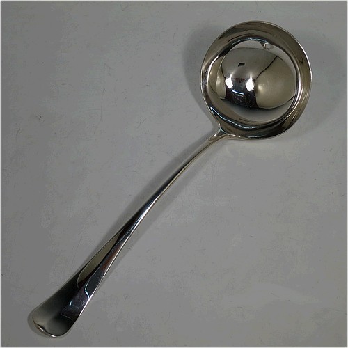 A very handsome Antique Edwardian Sterling Silver soup ladle in the Hanoverian Rattail pattern, having a plain handle with ridge and pip, and plain bowl with rattail on reverse. Made by Charles William Fletcher of Sheffield in 1905. The dimensions of this fine hand-made antique silver soup ladle are length 30 cms (11.75 inches), and it weighs approx. 251g (8 troy ounces).