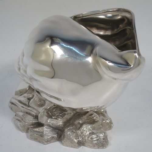 A handsome Antique Victorian Silver Plated spoon warmer, in the shape of a Conch shell, having a hand-chased body, and all sitting on a cast rock base with shells. Made in ca. 1880. The dimensions of this fine hand-made antique silver-plated spoon warmer are length 18 cms (7 inches), height 12 cms (4.75 inches), and width 10 cms (4 inches).