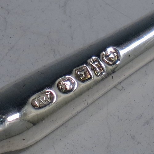 An Antique Georgian Sterling Silver and bone handled stilton cheese scoop, having a hand-cut handle, a hand-chased reeded ferrule, and a plain rounded cross-section stem with robust scoop. Made by Joseph Willmore of Birmingham in 1805. The dimensions of this fine hand-made antique silver and bone stilton cheese scoop are length 23.5 cms (9.25 inches).