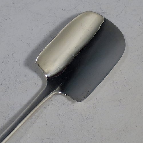 An Antique Georgian Sterling Silver and bone handled stilton cheese scoop, having a hand-cut handle, a hand-chased reeded ferrule, and a plain rounded cross-section stem with robust scoop. Made by Joseph Willmore of Birmingham in 1805. The dimensions of this fine hand-made antique silver and bone stilton cheese scoop are length 23.5 cms (9.25 inches).