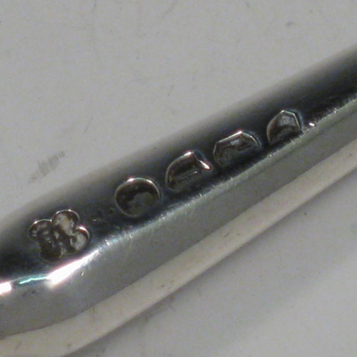Antique Victorian sterling silver stilton cheese scoop, having a very plain body with hand-cut ivory handle, plain round ferrule, and plain shank with scoop. Made by Angel and Savoury of London in 1881. The dimensions of this fine hand-made silver stilton cheese scoop are length 23 cms (9 inches).