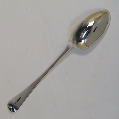 An elegant Antique Georgian Sterling Silver Old English pattern stuffing spoon, having a very plain handle with pip on reverse, and a plain oval bowl. This handsome antique silver serving spoon was made by John Whiting of London in 1833. The dimensions of this fine hand-made antique silver stuffing spoon are length 30.5 cms (12 inches), and it weighs approx. 128g (4.1 troy ounces).

  