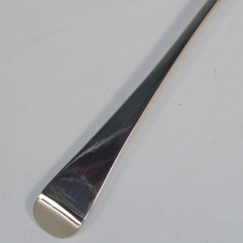 An elegant Antique Georgian Sterling Silver Old English pattern stuffing spoon, having a very plain handle with pip on reverse, and a plain oval bowl. This handsome antique silver serving spoon was made by John Whiting of London in 1833. The dimensions of this fine hand-made antique silver stuffing spoon are length 30.5 cms (12 inches), and it weighs approx. 128g (4.1 troy ounces).

  