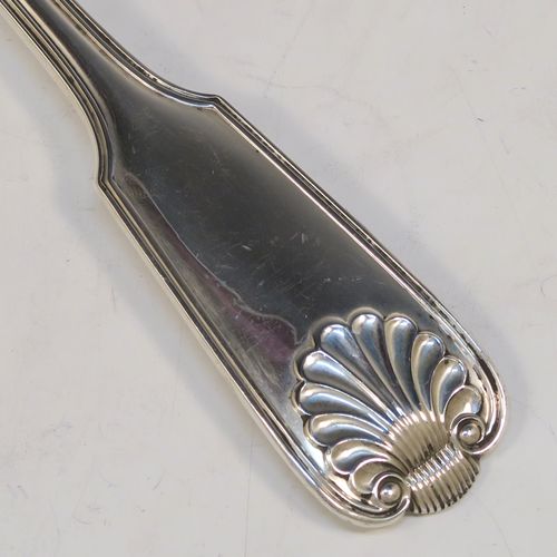 A handsome Antique Sterling Silver stuffing spoon in the double-struck Fiddle, Thread, and Shell patKings pattern. This beautiful antique silver stuffing or basting spoon was made by Francis Higgins of London in 1912. The dimensions of this fine hand-made silver stuffing spoon are length 30.5 cms (12 inches), and it weighs approx. 209g (6.7 troy ounces).