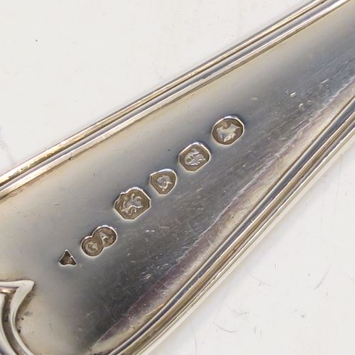 A very handsome Antique Victorian Sterling Silver stuffing spoon in the double-struck Old English and Thread pattern. This elegant antique silver spoon was made by George Adams of London in 1848. The dimensions of this fine hand-made antique silver stuffing spoon are length 30.5 cms (12 inches), and it weighs approx. 150g (4.8 troy ounces).