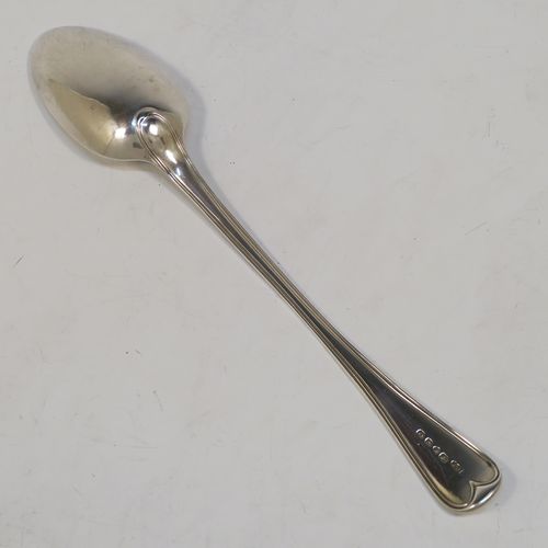 A very handsome Antique Victorian Sterling Silver stuffing spoon in the double-struck Old English and Thread pattern. This elegant antique silver spoon was made by George Adams of London in 1848. The dimensions of this fine hand-made antique silver stuffing spoon are length 30.5 cms (12 inches), and it weighs approx. 150g (4.8 troy ounces).