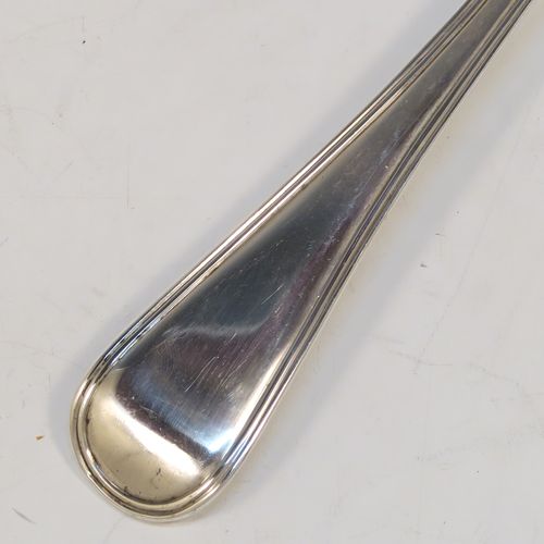 A very handsome Antique Victorian Sterling Silver stuffing spoon in the double-struck Old English and Thread pattern. This elegant antique silver spoon was made by George Adams of London in 1848. The dimensions of this fine hand-made antique silver stuffing spoon are length 30.5 cms (12 inches), and it weighs approx. 150g (4.8 troy ounces).