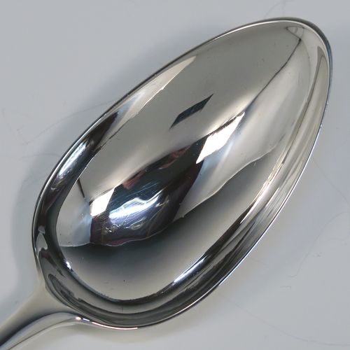 An elegant Antique Georgian Sterling Silver Old English pattern stuffing spoon, having a very plain handle with pip on reverse, and a plain oval bowl. This handsome antique silver serving spoon was made by Peter and Anne Bateman of London in 1794. The dimensions of this fine hand-made antique silver stuffing spoon are length 30.5 cms (12 inches), and it weighs approx. 110g (3.5 troy ounces). Please note that this item in monogrammed. 