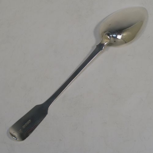 A handsome Antique early Victorian Sterling Silver Fiddle pattern stuffing spoon, having a very plain handle with pip on reverse, and a plain oval bowl with shoulders above. This elegant antique silver spoon was made by Charles Boyton I of London in 1837. The dimensions of this fine hand-made antique silver stuffing spoon are length 30 cms (11.75 inches), and it weighs approx. 96g (3 troy ounces).