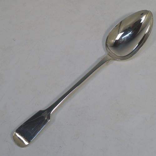 A handsome Antique early Victorian Sterling Silver Fiddle pattern stuffing spoon, having a very plain handle with pip on reverse, and a plain oval bowl with shoulders above. This elegant antique silver spoon was made by Charles Boyton I of London in 1837. The dimensions of this fine hand-made antique silver stuffing spoon are length 30 cms (11.75 inches), and it weighs approx. 96g (3 troy ounces).