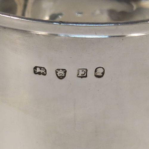 A handsome and rare Antique Georgian Sterling Silver sugar or sweetmeat bowl, having a plain round bellied body, with a hand-chased reeded border, and sitting on a pedestal foot. This elegant antique silver sugar bowl was made in London in 1800. The dimensions of this fine hand-made silver sweetmeat or sugar bowl are height 7.5 cms (3 inches), diameter 9 cms (3.5 inches), and it weighs approx. 167g (5.4 troy ounces).   