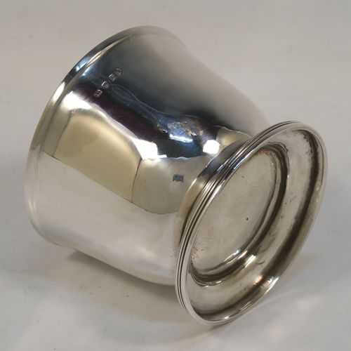 A handsome and rare Antique Georgian Sterling Silver sugar or sweetmeat bowl, having a plain round bellied body, with a hand-chased reeded border, and sitting on a pedestal foot. This elegant antique silver sugar bowl was made in London in 1800. The dimensions of this fine hand-made silver sweetmeat or sugar bowl are height 7.5 cms (3 inches), diameter 9 cms (3.5 inches), and it weighs approx. 167g (5.4 troy ounces).   