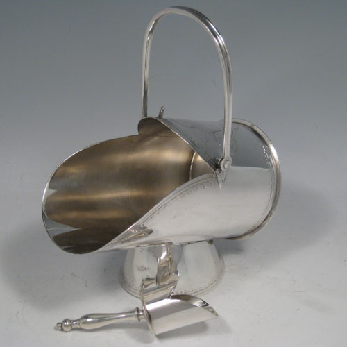Antique Victorian silver plated hand-engraved sugar scuttle with original scoop, made in ca. 1890. Length 17 cms (6.75 inches), width 8 ms (3.25 inches), height (including handle) 18 cms (7 inches).