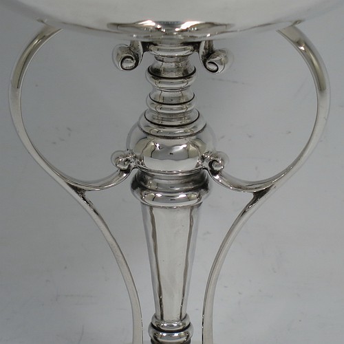 A very pretty Art Nouveau style Antique Edwardian Sterling Silver tazza dish or bowl, having a plain round bowl body with hand-hammered decoration, sitting on a pedestal foot with three scrolled side-handles. Made by James Dixon and Sons of Sheffield in 1905. The dimensions of this fine hand-made antique silver tazza bowl or dish are height 15 cms (6 inches), diameter of bowl 12 cms (4.75 inches), and it weighs approx. 272g (8.8 troy ounces).    