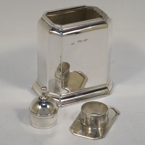 A very handsome Antique Victorian Sterling Silver tea caddy box, in an early Queen Anne style, having a straight-sided octagonal body, a slide out cover with round pull-off lid and finial (that doubles as a measure), and sitting on an octagonal collet foot. This elegant antique silver tea caddy box was made by George Unite of London in 1891. The dimensions of this fine hand-made silver tea caddy box are height 11 cms (4.3 inches), length 8 cms (3 inches), width 6 cms (2.3 inches), and it weighs approx. 155g (5 troy ounces).