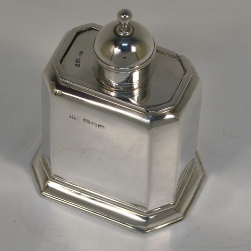 A very handsome Antique Victorian Sterling Silver tea caddy box, in an early Queen Anne style, having a straight-sided octagonal body, a slide out cover with round pull-off lid and finial (that doubles as a measure), and sitting on an octagonal collet foot. This elegant antique silver tea caddy box was made by George Unite of London in 1891. The dimensions of this fine hand-made silver tea caddy box are height 11 cms (4.3 inches), length 8 cms (3 inches), width 6 cms (2.3 inches), and it weighs approx. 155g (5 troy ounces).