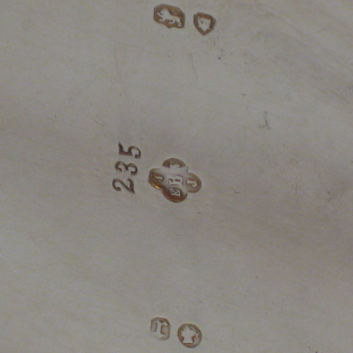 Antique Victorian sterling silver tea caddy box, having an oval straight-sided body, cast oval finial sitting on a lid with flat hidden hinge, applied bead edges top and bottom, with hand-chased and engraved floral work, and two vacant cartouches either side. Made by the Barnard Brothers of London in 1872. Height 13 cms (5 inches), length 14 cms (5.55 inches), width 10 cms (4 inches). Weight approx. 405g (13.1 troy ounces).