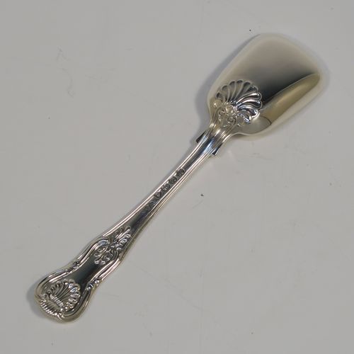 A large and handsome Antique Georgian Sterling Silver tea caddy spoon, having a double-struck Kings pattern handle, and a plain shovel style bowl. This beautiful silver tea caddy spoon was made by William Eley of London in 1833. The dimensions of this fine hand-made antique silver tea caddy spoon are length 14 cms (5.5 inches), width across bowl 3.5 cms (1.3 inches), and it weighs approx. 14g (1 troy ounce).