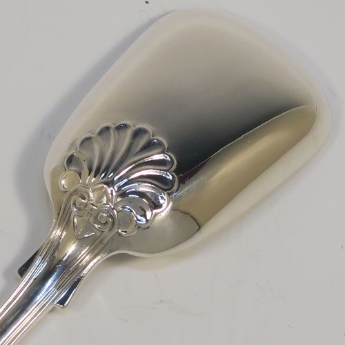 A large and handsome Antique Georgian Sterling Silver tea caddy spoon, having a double-struck Kings pattern handle, and a plain shovel style bowl. This beautiful silver tea caddy spoon was made by William Eley of London in 1833. The dimensions of this fine hand-made antique silver tea caddy spoon are length 14 cms (5.5 inches), width across bowl 3.5 cms (1.3 inches), and it weighs approx. 14g (1 troy ounce).
