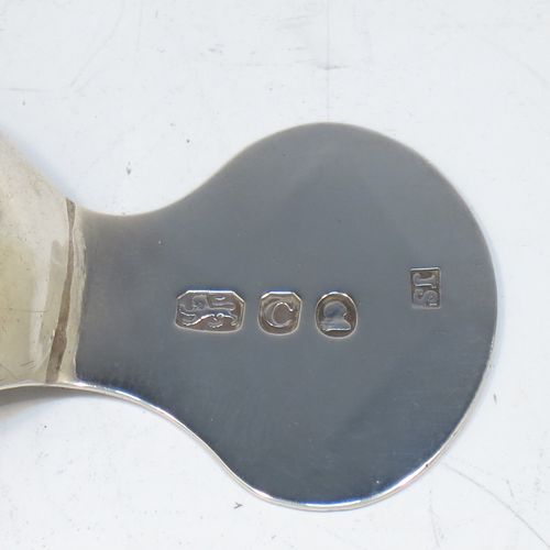 A very pretty Antique Georgian Sterling Silver tea caddy spoon, having an engraved flat handle, and a hand-chased shell style oval bowl. Made by Josiah Snatt of London in 1798. The dimensions of this fine hand-made antique silver tea caddy spoon are length 7 cms (2.75 inches), width 3.5 cms (1.3 inches), and it weighs approx. 9g (0.3 troy ounces).