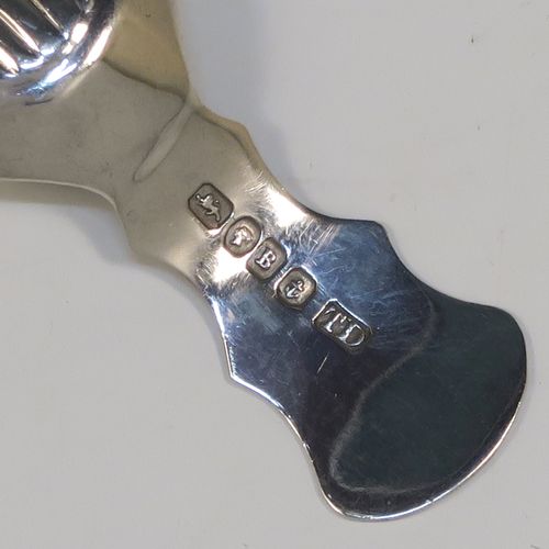 A very pretty Antique Victorian Sterling Silver tea caddy spoon, having a hand-engraved handle with floral and scroll decoration, and a hand-chased shell style bowl. This elegant antique silver tea caddy spoon was made by Thomas Danes of Birmingham in 1850. The dimensions of this fine hand-made antique silver tea caddy spoon are length 8 cms (3 inches), width 4 cms (1.5 inches), and it weighs approx. 7.5g (0.24 troy ounces).