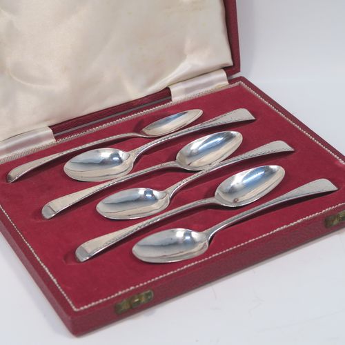 A very pretty Antique Georgian Sterling Silver set of six tea or coffee spoons, in the Old English Zig-Zag pattern, and having plain oval bowls, all in a cream satin and maroon velvet-lined presentation box. These beautiful antique silver spoons were made by William Eley and William Fearn of London in 1805. The dimensions of this fine hand-made set of silver teaspoons or coffee spoons are length of each spoon 13 cms (5.25 inches), and the total weight is approx. 99g (3.2 troy ounces).   