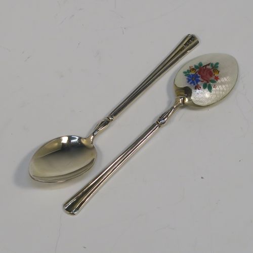 An extremely pretty Antique Sterling Silver and enamelled set of six tea or coffee spoons, having hand-painted and enamelled spoon backs in a floral design, all in their original cream satin and velvet-line presentation box. These beautiful antique silver and enamelled spoons were made by Turner and Simpson of Birmingham in 1915. The dimensions of this fine hand-made set of silver and enamelled teaspoons or coffee spoons are length of each spoon 10 cms (4 inches), and the total weight is approx. 66g (2.1 troy ounces). Please note that the enamel is in perfect order which is rare to find in spoons of this age.