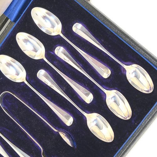 A beautiful Antique Edwardian Sterling Silver set of twelve teaspoons or coffee spoons and sugar nips in the Rattail Hanoverian pattern, all in their original cream satin and blue velvet-lined presentation box. This elegant set of antique silver spoons and sugar nips were made by Marin and Hall of Sheffield in 1905. The dimensions of this fine hand-made set of Rattail coffee spoons or teaspoons are length of each spoon 11 cms (4.3 inches), and the total weight is approx. 142g (4.6 troy ounce).