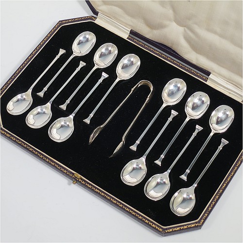 An Art Deco Sterling Silver set of 12 teaspoons or coffee spoons and sugar nips, having plain oval bowls, and handles in the Nail-End pattern, all in original cream satin and black velvet-lined presentation box. Made by the Cooper Brothers and Sons of Sheffield in 1923. The dimensions of this fine hand-made set of coffee spoons or teaspoons are length of each spoon 10 cms (4 inches), and the total weight is approx. 148g (4.8 troy ounce).