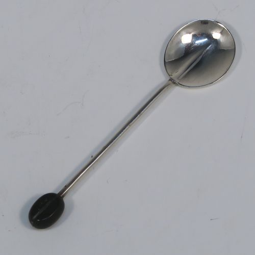 A handsome set of six Sterling Silver coffee spoons, having plain round bowls, and plain stems with wooden black stained coffee bean ends, all in their original cream satin and black velvet-lined presentation box. These elegant silver coffee spoons were made by the Adie Brothers of Birmingham in 1930. The dimensions of this fine hand-made set of coffee spoons are length of each spoon 9 cms (3.5 inches), and the total weight is approx. 31g (1 troy ounce).