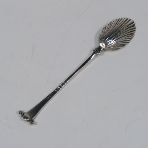 A very pretty Antique Victorian Sterling Silver set of six teaspoons and sugar nips in the Onslow pattern, having unusual oval bowls with lobed decoration and fluting on the reverse, all in their original cream satin and dark blue velvet-lined presentation box. These beautiful silver teaspoons and sugar nips were made by Charles Stuart Harris of London in 1894. The dimensions of this fine hand-made set of teaspoons are length of each spoon 11 cms (4.25 inches), and the total weight is approx. 93g (3 troy ounce).