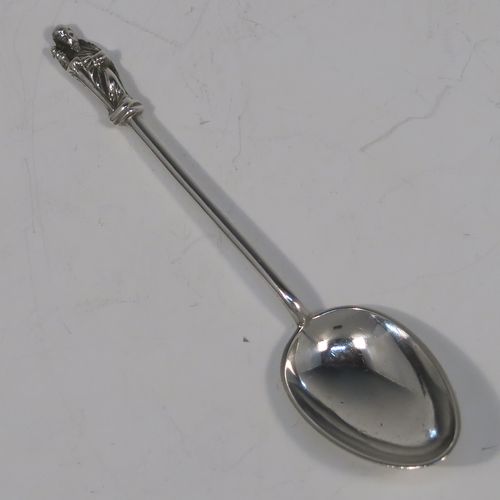 A handsome Antique Victorian Sterling Silver set of twelve Apostle end teaspoons or coffee spoons and sugar nips, all in their original dark blue satin and velvet-lined presentation box. This elegant set of antique silver Apostle spoons and sugar nips were made by William Hutton and Sons of London in 1898. The dimensions of this fine hand-made set of Apostle end coffee spoons or teaspoons are length of each spoon 10 cms (4 inches), and the total weight is approx. 185g (6 troy ounce).