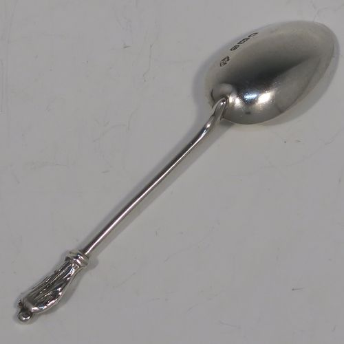A handsome Antique Victorian Sterling Silver set of twelve Apostle end teaspoons or coffee spoons and sugar nips, all in their original dark blue satin and velvet-lined presentation box. This elegant set of antique silver Apostle spoons and sugar nips were made by William Hutton and Sons of London in 1898. The dimensions of this fine hand-made set of Apostle end coffee spoons or teaspoons are length of each spoon 10 cms (4 inches), and the total weight is approx. 185g (6 troy ounce).