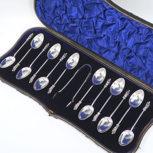 A handsome Antique Victorian Sterling Silver set of twelve Apostle end teaspoons or coffee spoons and sugar nips, all in their original dark blue satin and velvet-lined presentation box. This elegant set of antique silver Apostle spoons and sugar nips were made by William Hutton and Sons of London in 1898. The dimensions of this fine hand-made set of Apostle end coffee spoons or teaspoons are length of each spoon 10 cms (4 inches), and the total weight is approx. 185g (6 troy ounce).