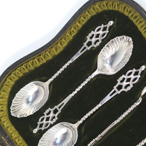 A stunning Antique Edwardian Sterling Silver set of six tea or coffee spoons and sugar nips, with twisted stems, fluted oval bowls, and hand-pierced handles, all in their original olive satin and dark-green velvet-lined presentation box. These beautiful antique silver spoons and sugar nips were made by Jackson and Fullerton of London in 1904. The dimensions of this fine hand-made set of silver teaspoons or coffee spoons and sugar nips are length of each spoon 12 cms (4.75 inches), and the total weight is approx. 113g (3.6 troy ounces).