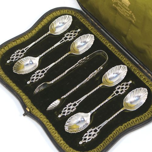 A stunning Antique Edwardian Sterling Silver set of six tea or coffee spoons and sugar nips, with twisted stems, fluted oval bowls, and hand-pierced handles, all in their original olive satin and dark-green velvet-lined presentation box. These beautiful antique silver spoons and sugar nips were made by Jackson and Fullerton of London in 1904. The dimensions of this fine hand-made set of silver teaspoons or coffee spoons and sugar nips are length of each spoon 12 cms (4.75 inches), and the total weight is approx. 113g (3.6 troy ounces).