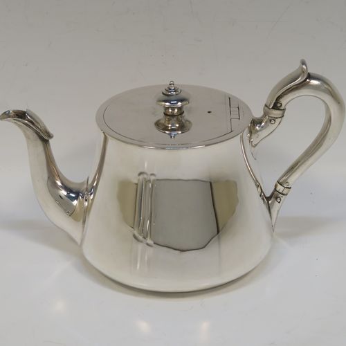 A very handsome Antique Victorian Sterling Silver three-piece tea set, consisting of a teapot, sugar bowl and cream jug. The bodies in a plain round bellied style with scroll handles, the teapot with a flat topped hinged lid and a silver handle and finial, the sugar bowl and cream jug with gold-gilt interiors, and all sitting on flat bases. This elegant silver tea set was made by Hunt and Roskell of London in 1878. The dimensions of this fine hand-made antique silver tea service are length of teapot 20 cms (8 inches), height 12.5 cms (5 inches), and it weighs a total of approx. 950g (31 troy ounces).  