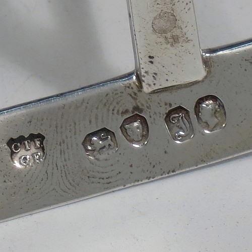 A very handsome and unusual Antique Victorian Sterling Silver seven-bar toast-rack, having plain panelled wire-work bars with central struts, a wire-work diamond-shaped handle, attached to a plain cut-corner rectangular base with a strengthening strut, and sitting on four cast flanged feet. Made by Charles and George Fox of London in 1844. The dimensions of this fine hand-made antique silver toast-rack are length 16 cms (6.3 inches), height 15 cms (6 inches), width 10 cms (4 inches), and it weighs approx. 375g (12 troy ounces).