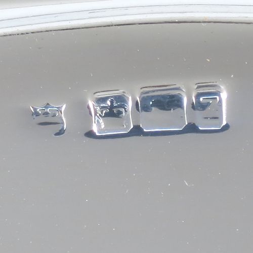 A very pretty Antique Victorian Sterling Silver oval two-handled tea tray, having a plain ground, with straight-fluted border and applied reeded edge, all sitting on a flat base. This very handsome silver tray was made by James Walter Deakin of Sheffield in 1892. The dimensions of this fine hand-made silver tray are length 46 cms (18 inches), width 32 cms (12.5 inches), and it weighs approx. 1,125g (36.3 troy ounces).