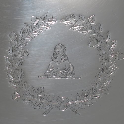 An Antique Georgian Sterling silver oval two-handled tea tray, with a beautifully hand-engraved band of floral decoration, an applied reeded border with matching cast handles, and sitting on a flat base. This handsome Georgian sterling silver tray was made by Elizabeth Jones of London in 1794. The dimensions of this fine hand-made silver tray are length inc. handles 52 cms (20.5 inches), width 34 cms (13.5 inches), and it weighs approx. 1,593g (51 troy ounces).