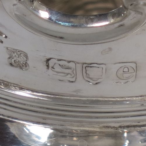 A very pretty pair of Antique Victorian Sterling Silver Art Nouveau style vases, having hand-chased floral and scroll decoration, with hand-pierced upper necks and applied scroll borders, and all sitting on round stepped pedestal feet. Made by Walter and Charles Sissons of London in 1900. The dimensions of this fine pair of hand-made antique silver Art Nouveau vases are height 17 cms (6.75 inches), and diameter at top 7 cms (2.75 inches). Please note that these vases are not loaded, and the total weight of silver is 422g (13.6 troy ounces).