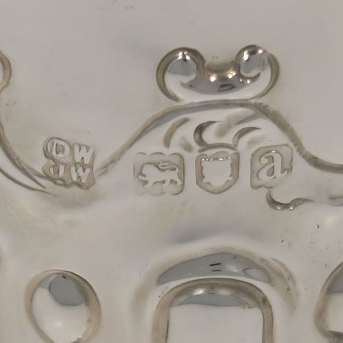 A very pretty Antique Victorian Sterling Silver pair of table flower vases, having round bodies with tapering sides and hand-chased fluting, and bead work decoration, and sitting on pedestal feet. These beautiful silver vases were made by D. and J. Welby of London in 1896. The dimensions of these fine hand-made antique silver pair of vases are height 15 cms (6 inches), diameter at top 7.5 cms (3 inches), and they weigh at total of approx. 310g (10 troy ounces). Please note that these vases are not loaded, so the whole weight is silver.