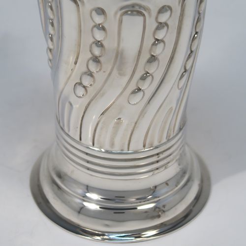 A very pretty Antique Victorian Sterling Silver pair of table flower vases, having round bodies with tapering sides and hand-chased fluting, and bead work decoration, and sitting on pedestal feet. These beautiful silver vases were made by D. and J. Welby of London in 1896. The dimensions of these fine hand-made antique silver pair of vases are height 15 cms (6 inches), diameter at top 7.5 cms (3 inches), and they weigh at total of approx. 310g (10 troy ounces). Please note that these vases are not loaded, so the whole weight is silver.