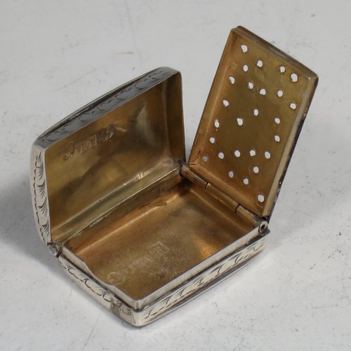 An Antique Victorian Sterling silver vinaigrette, having hand-engraved floral decoration, reeded sides, a gold-gilt interior, and a hand-pierced grill with floral work. Made by Joseph Taylor of Birmingham in 1843. The dimensions of this fine hand-made silver vinaigrette are length 2.5 cms (1 inch), width 2 cm (0.6 inches), and depth 0.8 cm (0.3 inches).