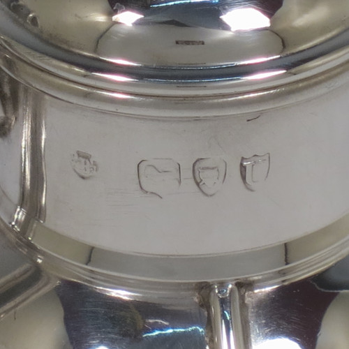 A small but handsome and unusual Antique Victorian Sterling Silver Guernsey style water / milk jug for one person, having a plain round bellied body with applied reeded girdles, a scroll handle, a pull-off lid, and all sitting on a flat base. Made by the Barnard Brothers of London in 1895. The dimensions of this fine hand-made antique silver Guernsey jug are height 9.5 cms (3.75 inches), diameter of body 7 cms (2.75 inches), and it weighs approx. 90g (3 troy ounces).