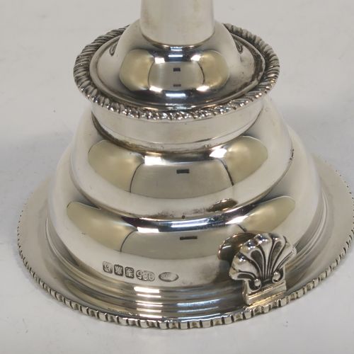 An elegant Scottish Sterling Silver wine decanting funnel, having a plain round body with a gold-gilt interior and applied gadroon borders, a cast shell side clip, and removable funnel. This handsome silver wine decanting funnel was made by Goodwins of Edinburgh in 2001. The dimensions of this fine hand-made silver wine decanting funnel are height 13 cms (5 inches), diameter of bowl 8 cms (3 inches), and it weighs approx. 127g (4 troy ounces).